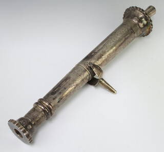 A Continental silver model of a canon with chased scroll and leaf decoration 50cm, 713 grams 