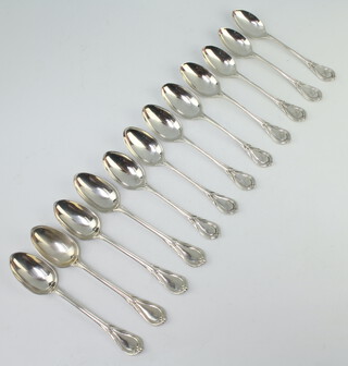 Four Victorian silver lily pattern teaspoons London 1876 and 8 others mixed dates, 352 grams