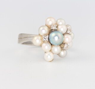 A 14ct white gold pearl and diamond cocktail ring size L 1/2, 6.9 grams 