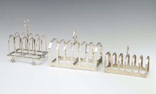 An Edwardian silver 5 bar toast rack London 1910, ditto Sheffield 1932 and 1 other Sheffield 1953, 388 grams 