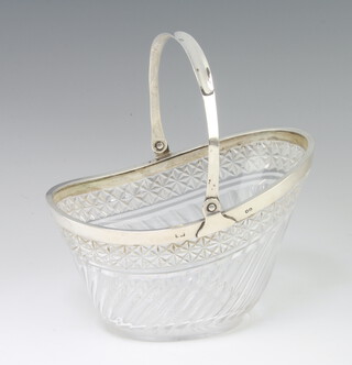 A Victorian silver mounted cut glass bowl with swing handle London 1869, 13cm 