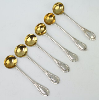 Three Victorian silver lily pattern mustard spoons with gilt bowls Birmingham 1850, 3 ditto London 1860 132 grams