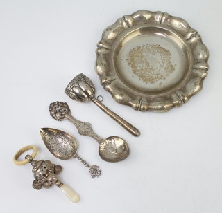 An Edwardian silver mother of pearl and bone rattle/teether, Birmingham 1910, 2 Continental spoons, a rattle and dish 