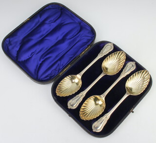 A cased set of 4 Victorian silver lily pattern serving spoons with gilt bowls London 1889, 392 grams