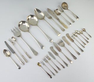 A pair of silver serving spoons Sheffield 1925 and minor cutlery weighable silver 712 grams
