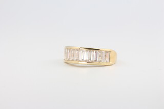 A 14ct yellow gold baguette set paste ring 3.9 grams 