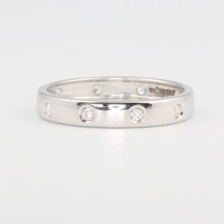 An 18ct white gold eternity ring size N, 2.3 grams 