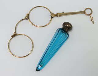 An Edwardian gilt lorgnette together with a silver mounted blue glass scent