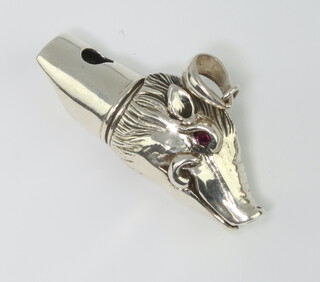 A Continental silver boars head whistle, 19 grams