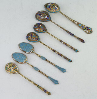 Five Russian silver and enamelled spoons together with 2 English ditto