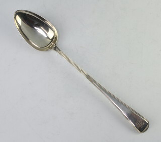 A George III silver basting spoon with engraved armorial, London 1798, 124 grams 