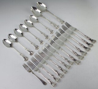A set of Edwardian silver Kings pattern cutlery comprising 6 dessert spoons, 2 tablespoons, 6 dessert forks, 6 dinner forks and 1 odd fork, mixed dates and makers 1654 grams 