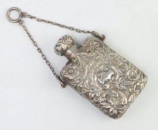 A Victorian repousse silver rounded rectangular scent bottle and stopper Birmingham 1887, 29 grams, 6cm 