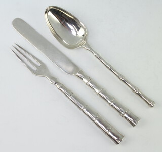 A silver handled bamboo pattern knife, fork and spoon, Sheffield 1903 