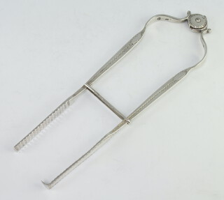 A pair of Georgian silver bright cut tongs 146 grams