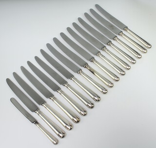 15 silver handled dinner knives Sheffield 1962, ditto butter knife 