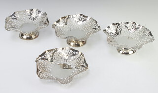 A set of 3 silver tazzas with pierced decoration London 1965 together with a ditto dish, 416 grams 