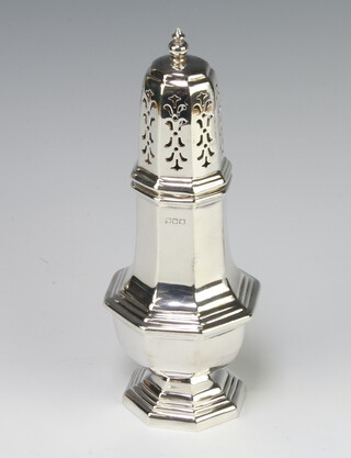 A silver octagonal sugar shaker 144 grams, 18cm marks rubbed