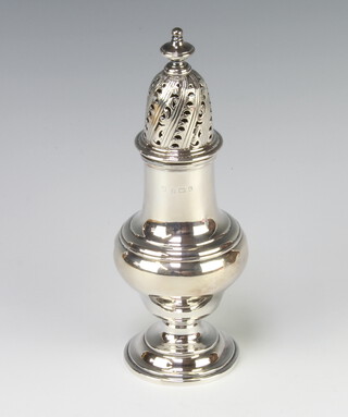 An Edwardian Queen Anne style silver sugar shaker of baluster form Birmingham 1904, 21cm, 230 grams 