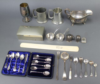 A silver plated sauce boat, cased spoons, cigarette box and other minor plated items