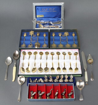 Two sets of silver plated menu holders and minor plated cutlery 