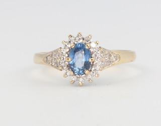 A 9ct yellow gold sapphire and diamond cluster ring, 2 grams, size N