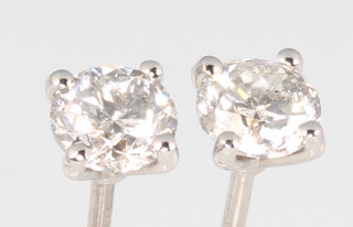 A pair of 18ct white gold brilliant cut diamond ear studs, approx. 1.02ct, 2.1 grams