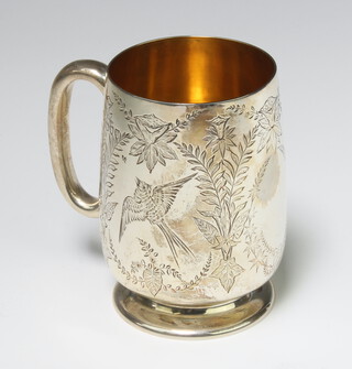 A Victorian silver baluster mug decorated with flowers and birds London 1894, 166 grams, 10cm 