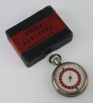 An American chrome cased pocket roulette machine 5cm diam. in original box 