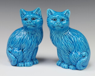 A pair of Continental turquoise glazed figures of seated cats stamped 222, 15cm 