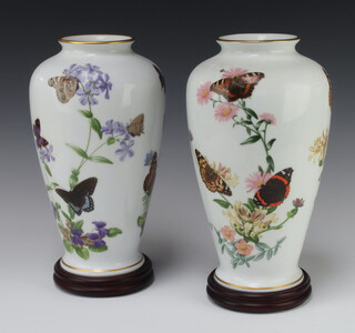 A pair of Franklin Mint Meadowland Butterfly vases 28cm 