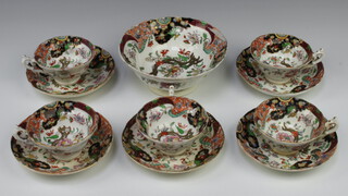 A 19th Century Imari style tea and coffee set comprising 4 coffee cups (1 a/f), 11 large tea cups (3 a/f)), 7 saucers (all a/f) and a slop bowl (a/f)