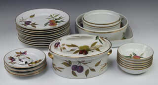 A Worcester Evesham part dinner service comprising 6 side plates, 10 dinner plates, 6 dessert bowls, a pie dish, fruit bowl, 2 souffles and an oval tureen and cover 