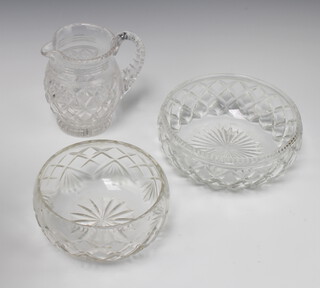 A cut glass water jug 17cm (crack to handle of jug)  and 2 cut glass fruit bowls 22cm and 18cm 