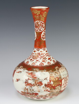 A late 19th Century Kutani oviform vase decorated with panels of flowers 24cm 