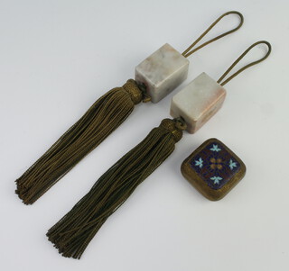A pair of carved soapstone fobs of rectangular form with silk tassles 4cm together with a rounded square pill box