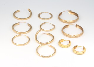 Five pairs of 9ct yellow gold hoop earrings, 9.2 grams
