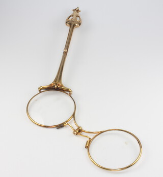 A pair of 14ct yellow gold Edwardian lorgnettes with pierced handle and engraved monogram 