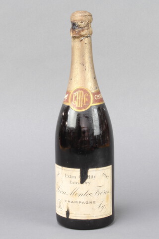 A bottle of 1947 Extra Quality Extra Dry Leon Monte Fieres Champagne 