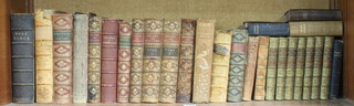 Volumes 1-7 "Works of Alfred Lord Tennyson Poet Lecturer" published London Macmillan & Co 1884, leather bound together with other leather bound volumes  