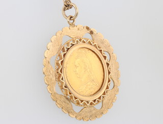 A Victorian half sovereign 1891, contained in a 9ct yellow gold mount with chain, 10 grams 