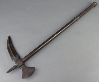 A Victorian engraved steel battleaxe handle 71cm, head 27cm 