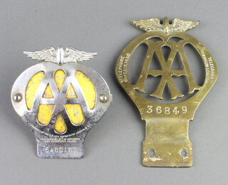 A pierced brass AA radiator badge no.36849 1906-1930 together with an AA beehive radiator badge 5A80183 1957-1959 