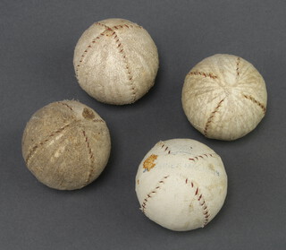 Jeffries Malling, a leather golf ball 3.5cm (a/f) and 3 other golf balls