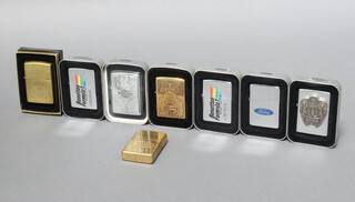 Eight Zippo lighters - four Harley Davidson Motorcycles, Ford, two Benetton Formula One, all boxed and a Land Rover ditto 
 