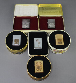 Two 60th Anniversary Zippo lighters, a limited edition Harley Davidson 90th Reunion lighter, another Harley Davidson lighter, an Indianapolis 500 and The Varga girl 1935, all contained in tins    