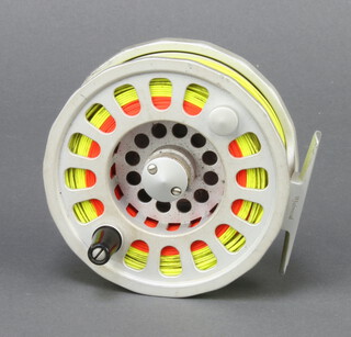 A Wychwood Extremis fly fishing reel with 7/8/9 line weight contained in original pouch 