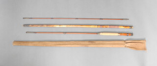 An early 9' 3 piece cane trout fly fishing rod with 2 tips and tube lining net handle in a cloth bag 