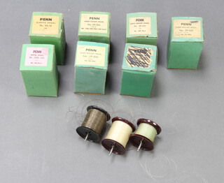 Seven Penn lightweight fishing spools boxed, together with 3 others (unboxed)  
