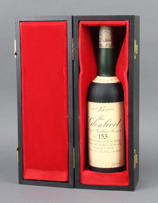 A limited edition bottle of The Glenlivet 25 Year Old Reserve single malt whisky, to celebrate the wedding of HRH The Prince of Wales, boxed no.153 
